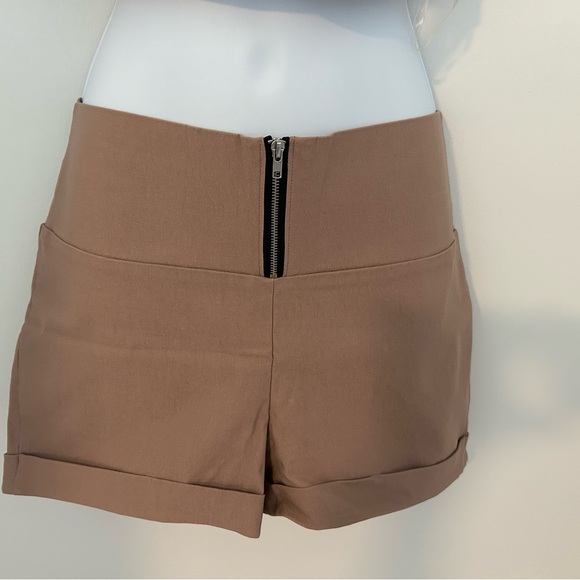 Mauve colored top and shorts.
Stretchy - Picture 7 of 12